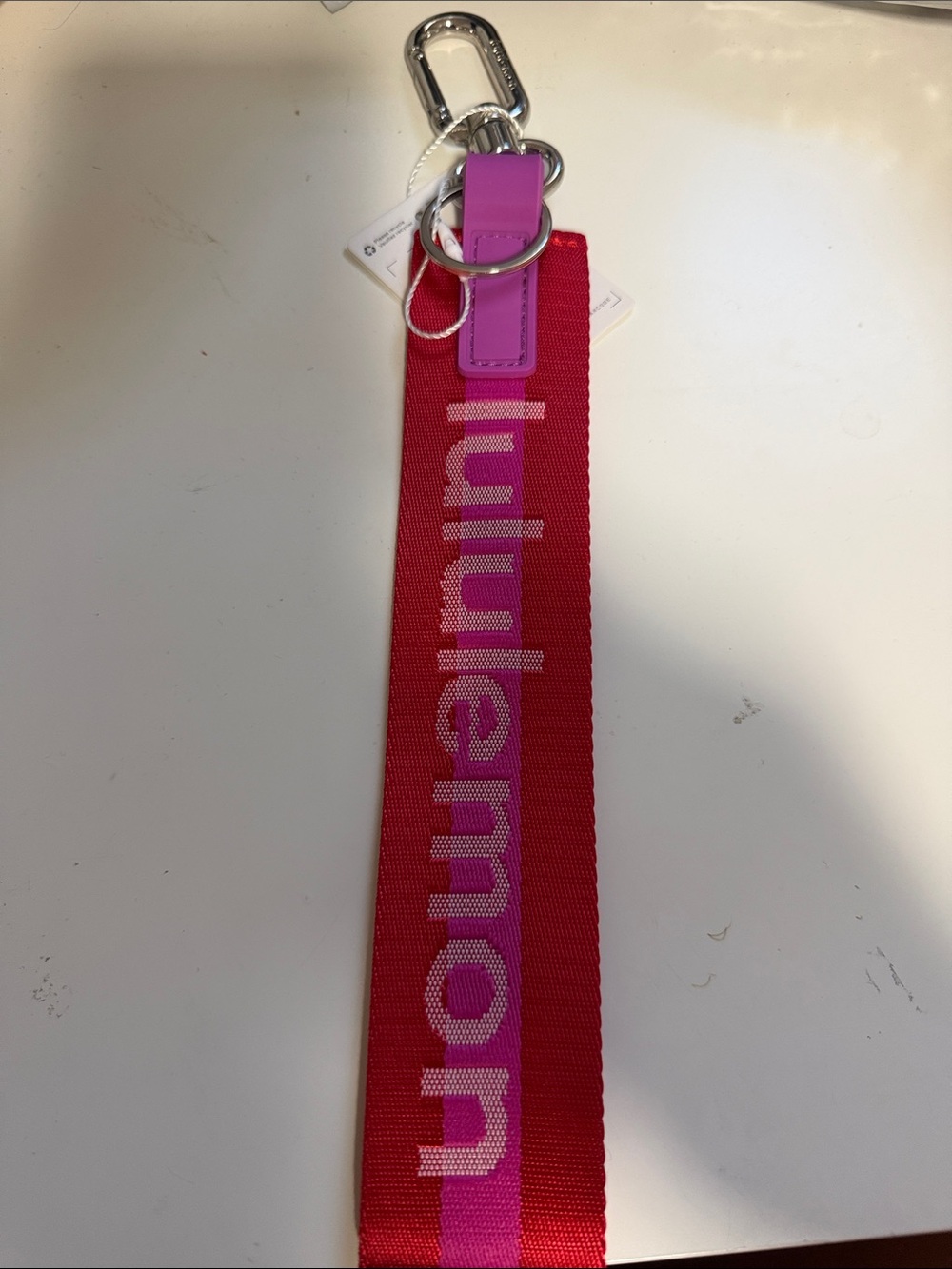 Lululemon | never lost keychain red pink purple